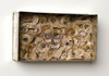 <strong>Figure of Eight Moth,</strong>, 2012<br />
<em>Size:</em> 11,5 x 20 x 5,6 cm<br />
<em>Technique:</em> hand embroidery, mixed media<br />	
<em>Material:</em> silk threads, Annual Honesty, old tin box